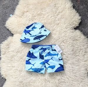 Baby boy swim shorts and matching hat. Whale print